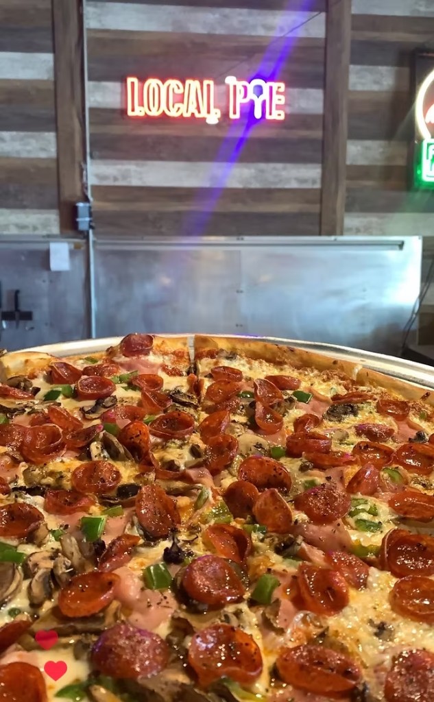 Local Pye pizza and neon sign